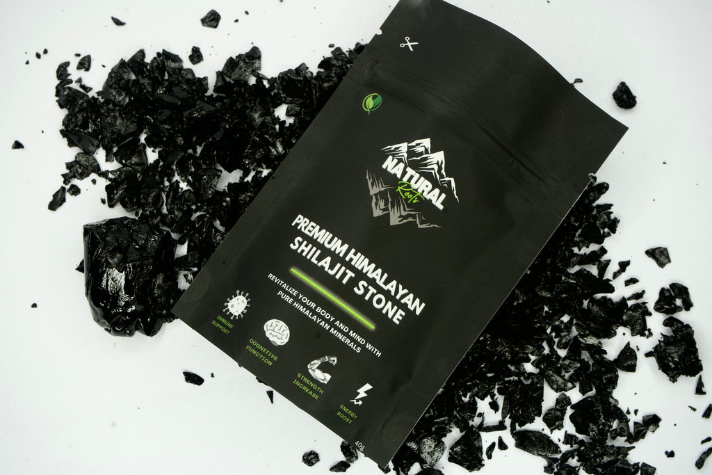 Black package of Premium Himalayan Shilajit Stone with visible branding on a white background with shilajit stones.